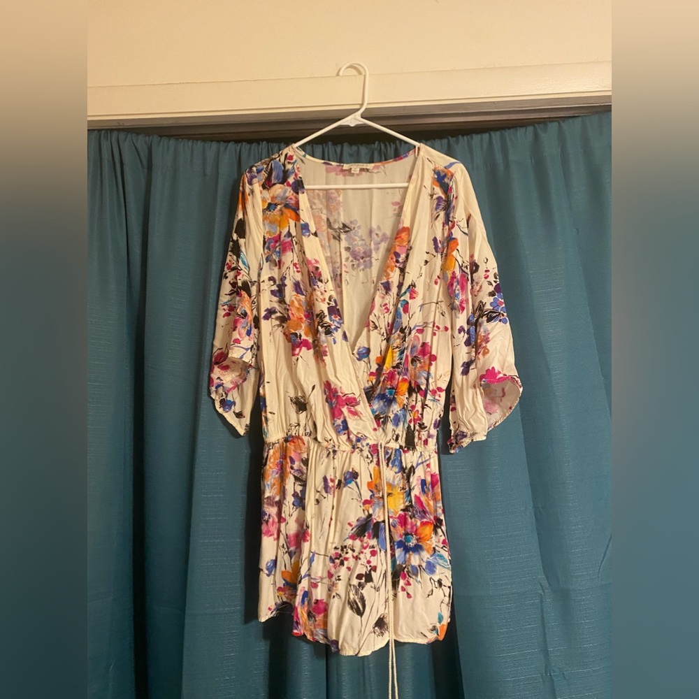 Cream colored romper with flowers
